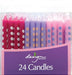 24 pc candle pack with magenta, purple, and light pink candles with polka dots on each candle