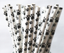 white paper straw with black puppy paw all over print for dog themed and puppy parties